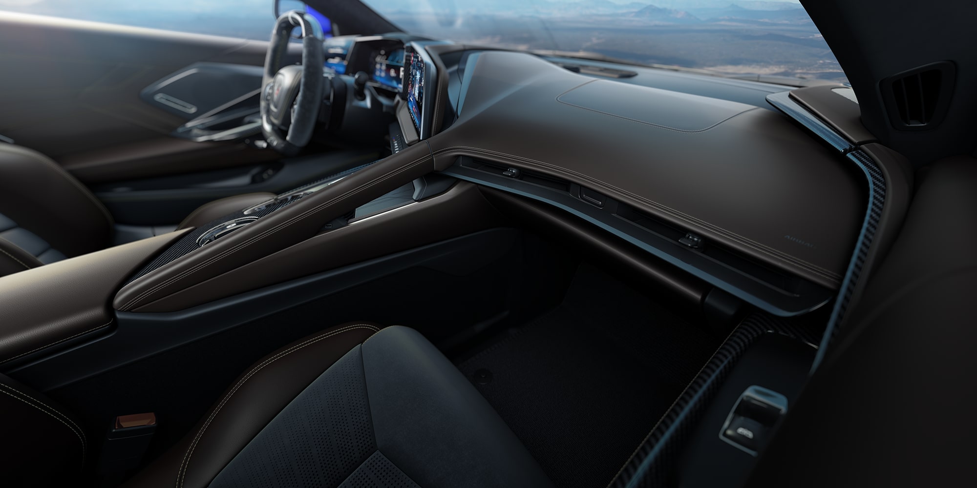 2026 Chevrolet Corvette Stingray Interior in Very Dark Atmosphere with Natural Tan Accents.