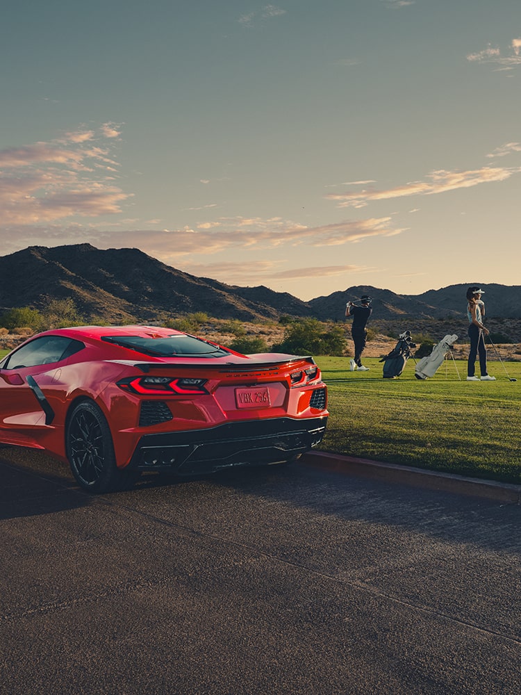 2026 Chevrolet Corvette Stingray Parked Next to a Driving Range.