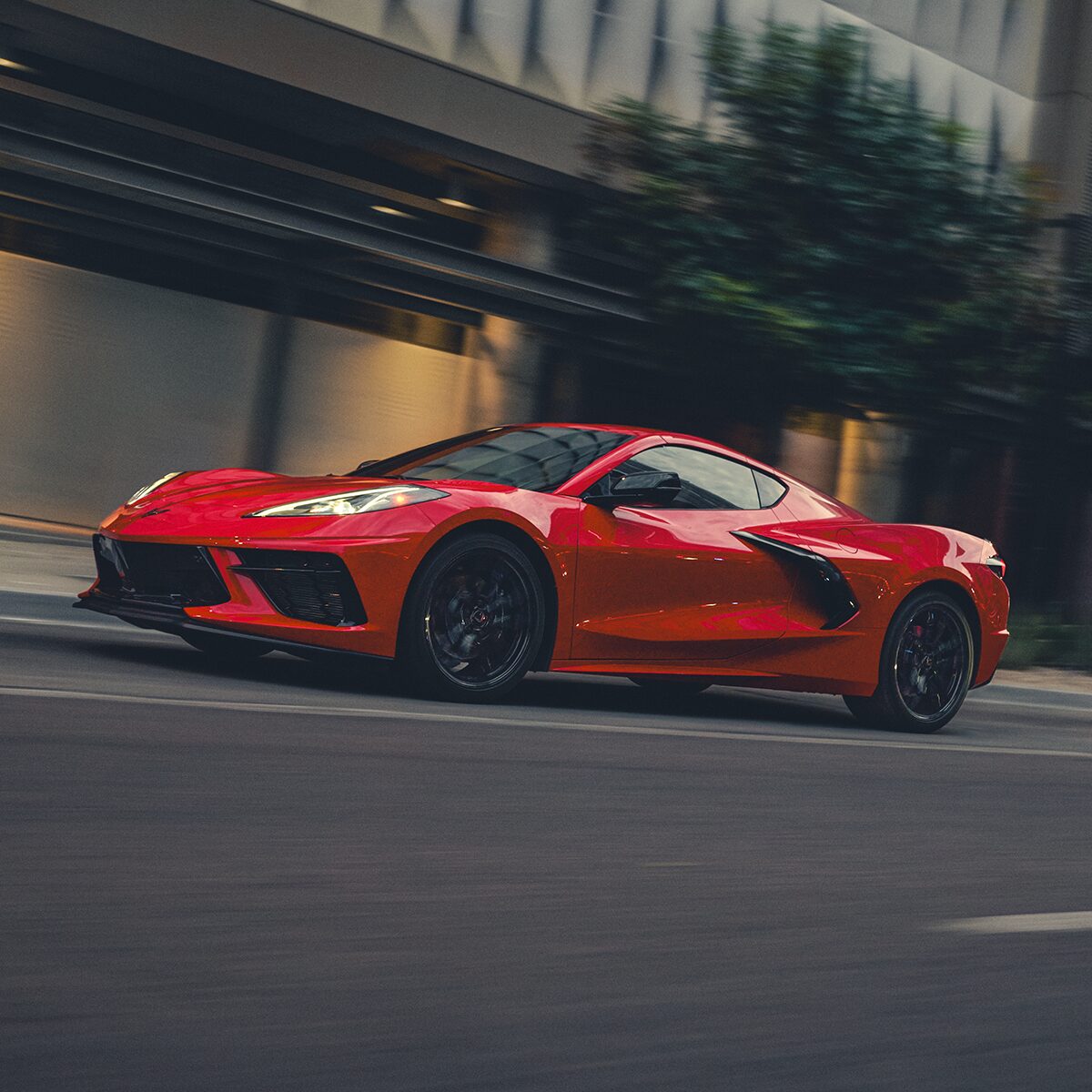 2026 Chevrolet Corvette Stingray Speeding Down a Road.