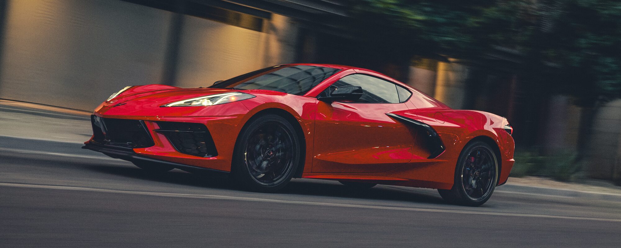 2026 Chevrolet Corvette Stingray Speeding Down a Road.