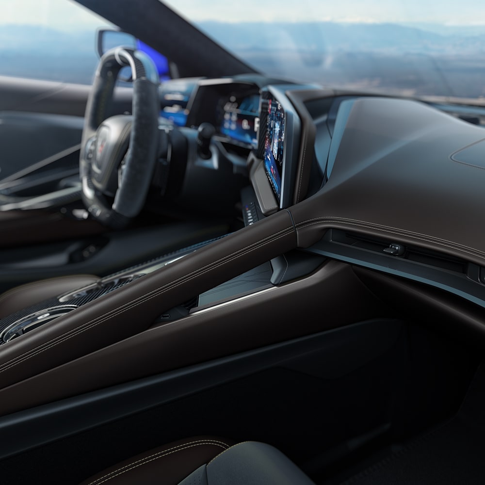 Front passenger's view of the interiors of the 2026 Chevrolet Corvette ZR1 in Very Dark Atmosphere with Natural Tan Accents.