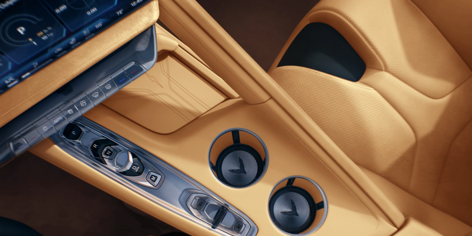 Gros plan sur l'intérieur d'une Chevrolet Corvette Z06 2027, mettant en valeur une console centrale en cuir beige et un double porte-gobelet.