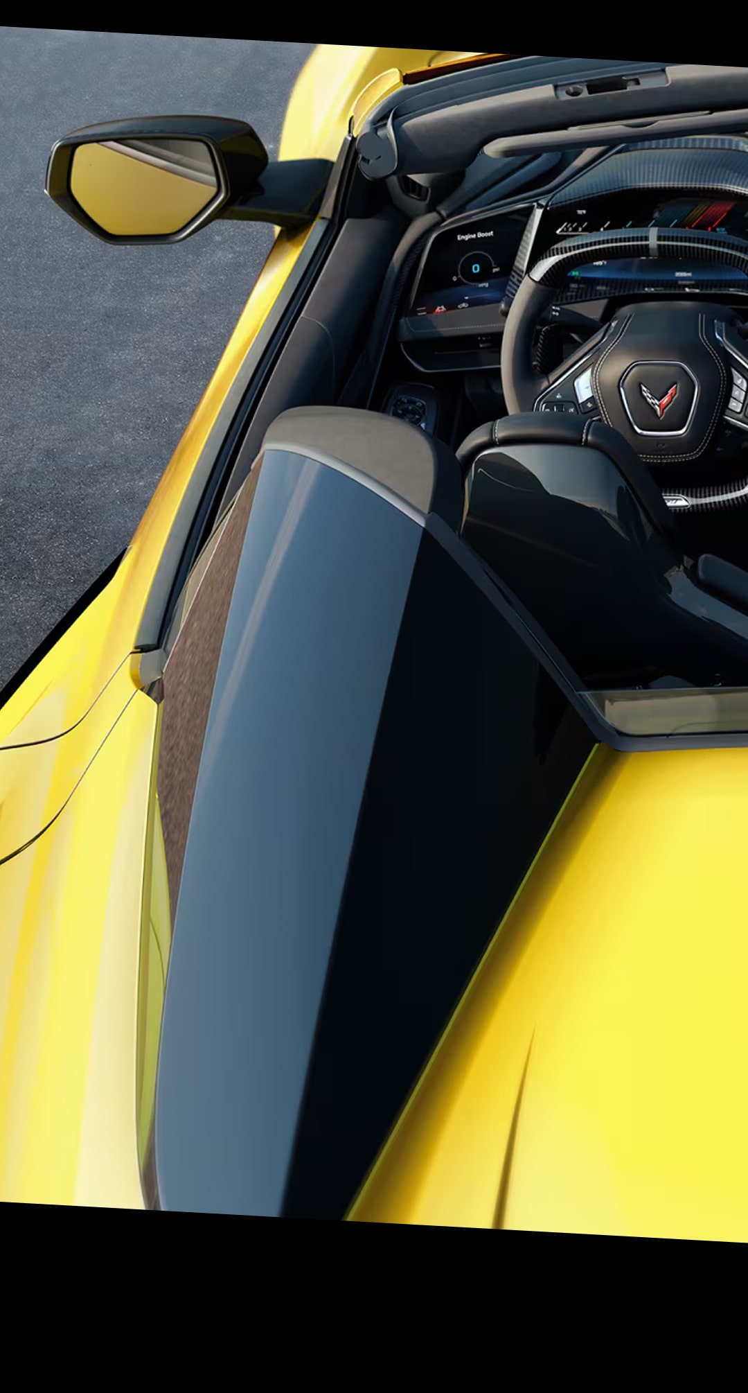 Vue d’oiseau de la Chevrolet Corvette ZR1 2027 avec le toit décapotable baissé.