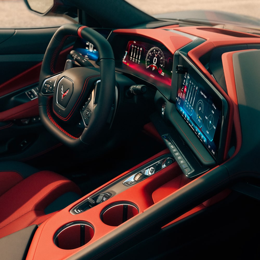 Intérieur de la Chevrolet Corvette ZR1 2027 en rouge adrénaline asymétrique avec noir jais.