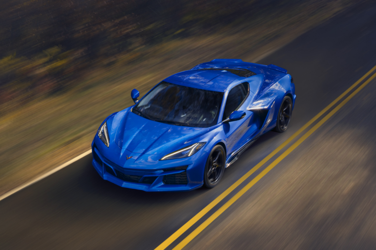 Birds Eye View of the Blue Corvette E-Ray Driving on Street