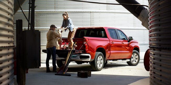 Workers Loading Up Durabed of 2022 Chevrolet Silverado LTD.