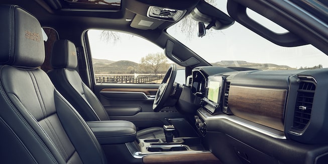 2023 Chevrolet Silverado 1500 interior view of front seats from passenger side door.