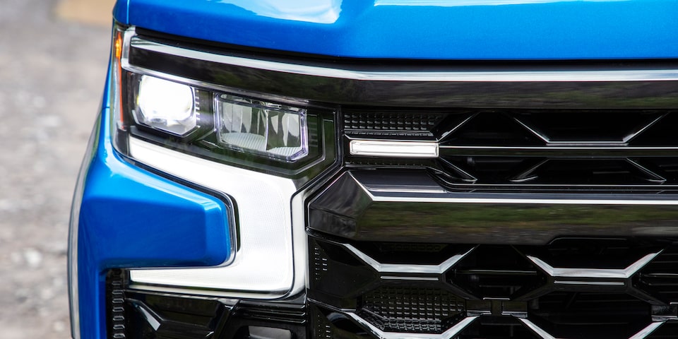 The IntelliBeam High Beam Assist feature of the 2024 Chevrolet Silverado maintaining control of the headlight function.