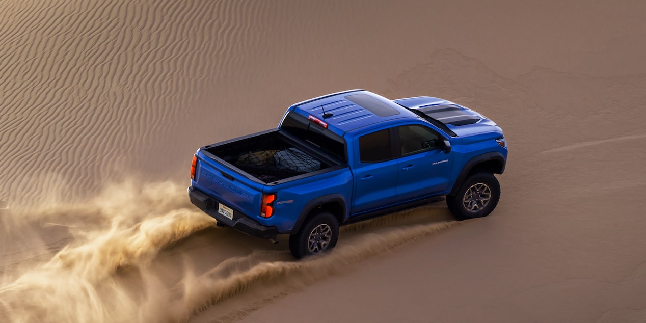 Overhead View of a Blue 2026 Chevrolet Colorado Driving through the Desert.