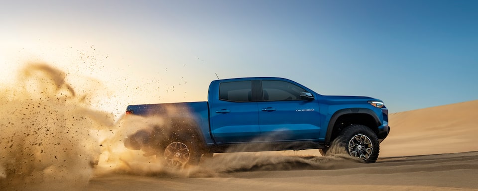 The 2023 Colorado Drives Through the Desert with Ease kicking Up Sand in the Process.