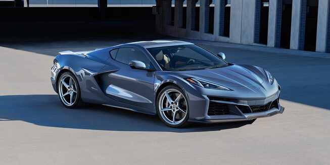 The All-New 2024 Corvette E-Ray, parked on a road.