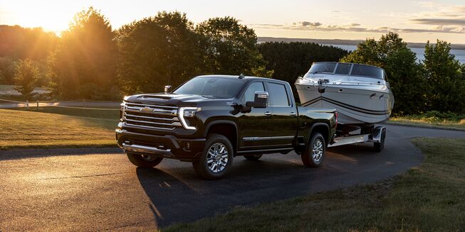 2024 Silverado HD towing a boat.
