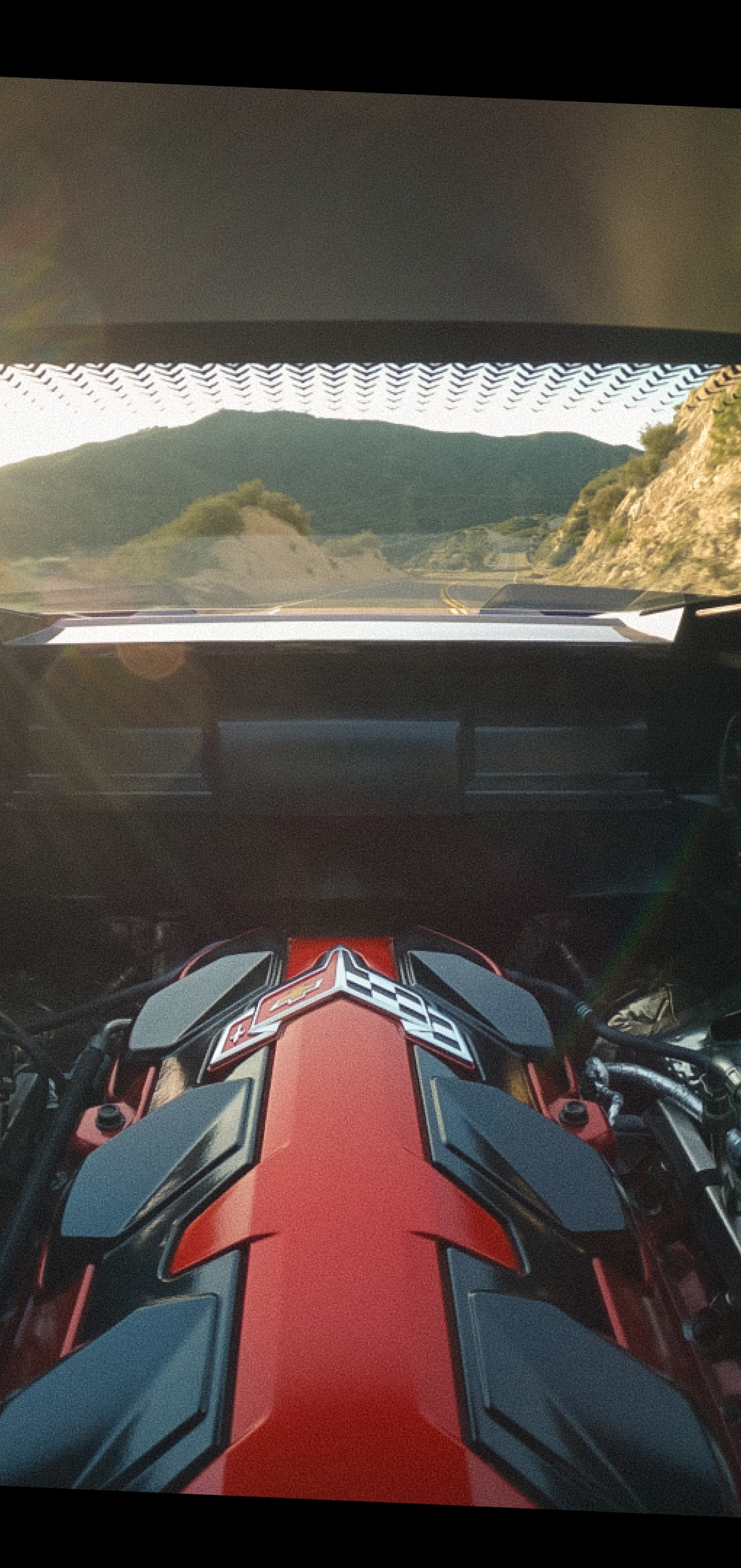 Gros plan du logo Grand Sport gravé sur l’extérieur de la Chevrolet Corvette Grand Sport 2027.