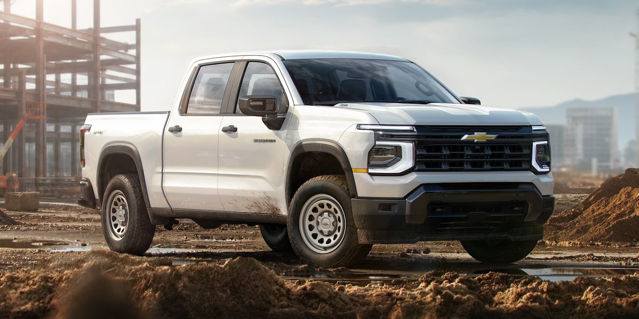 Side view of the Next-Generation 2027 Silverado 1500 Truck parked near a construction site.