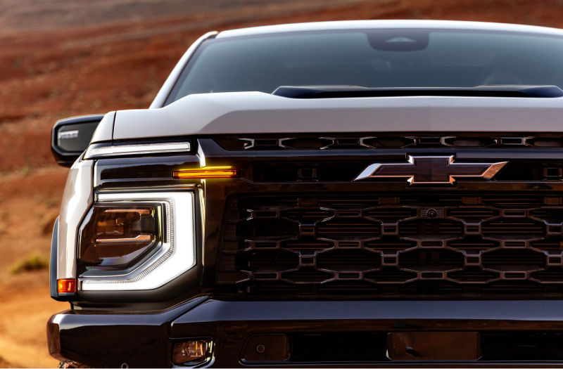 Close-up of the front grille and LED headlight on a 2027 Chevrolet Silverado 1500 ZR2