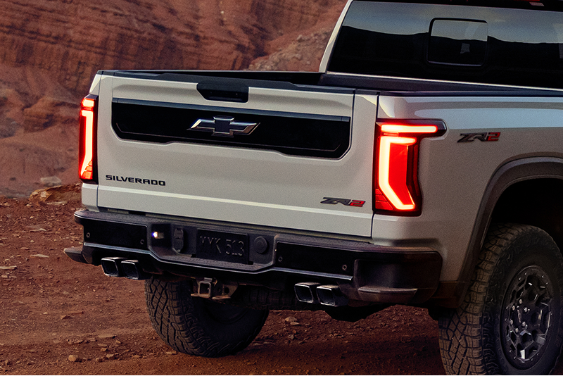 Rear view of a 2027 Chevrolet Silverado 1500 ZR2 with LED taillights illuminated