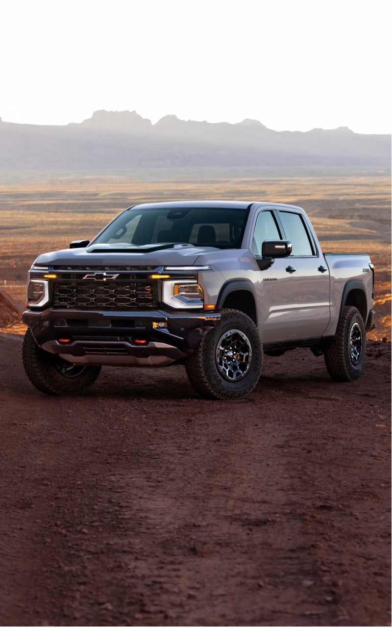 2027 Chevrolet Silverado 1500 ZR2 parked in a rugged desert landscape