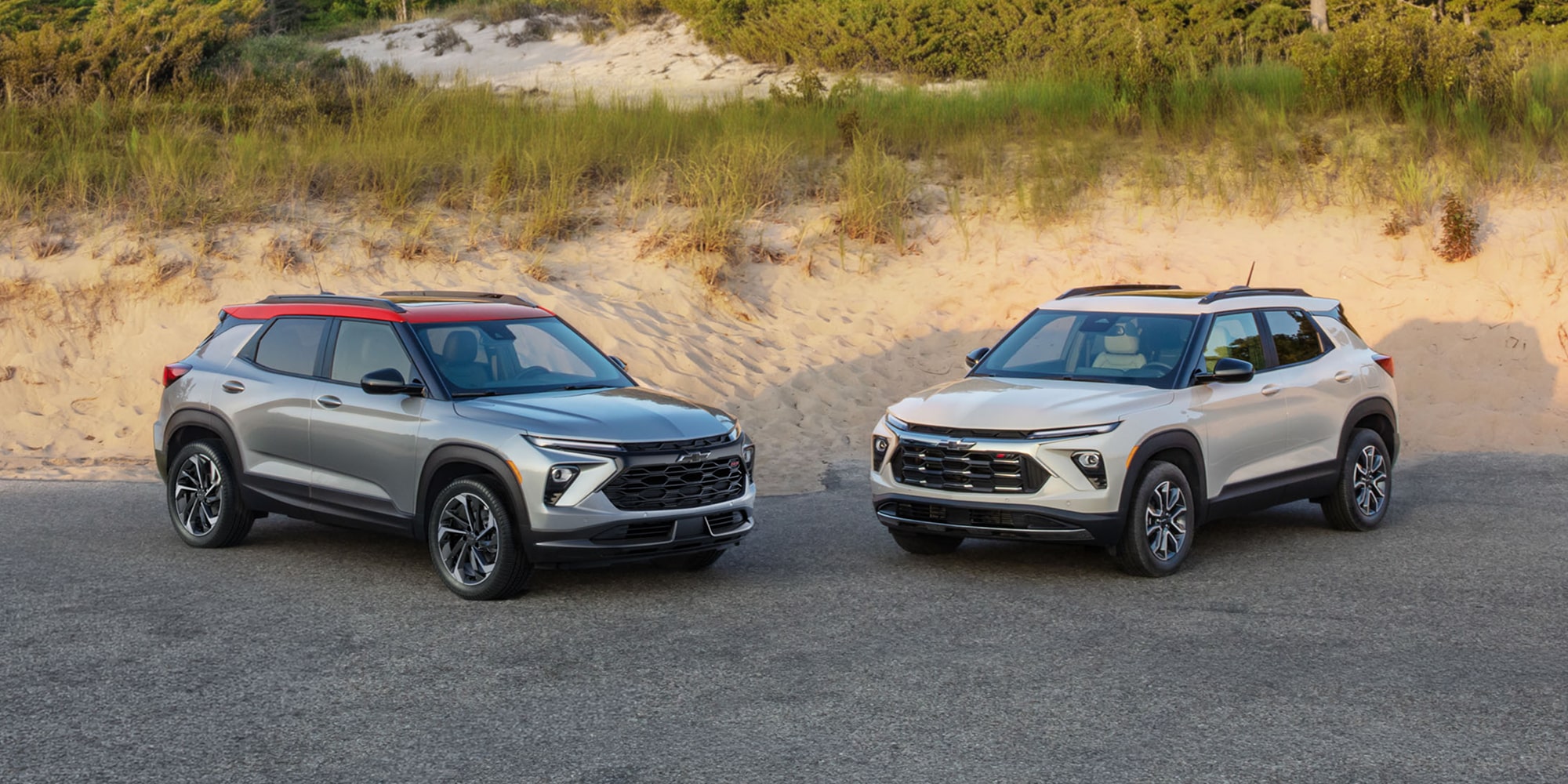 Two 2027 Chevrolet Trailblazer SUVs parked side by side on a paved surface.