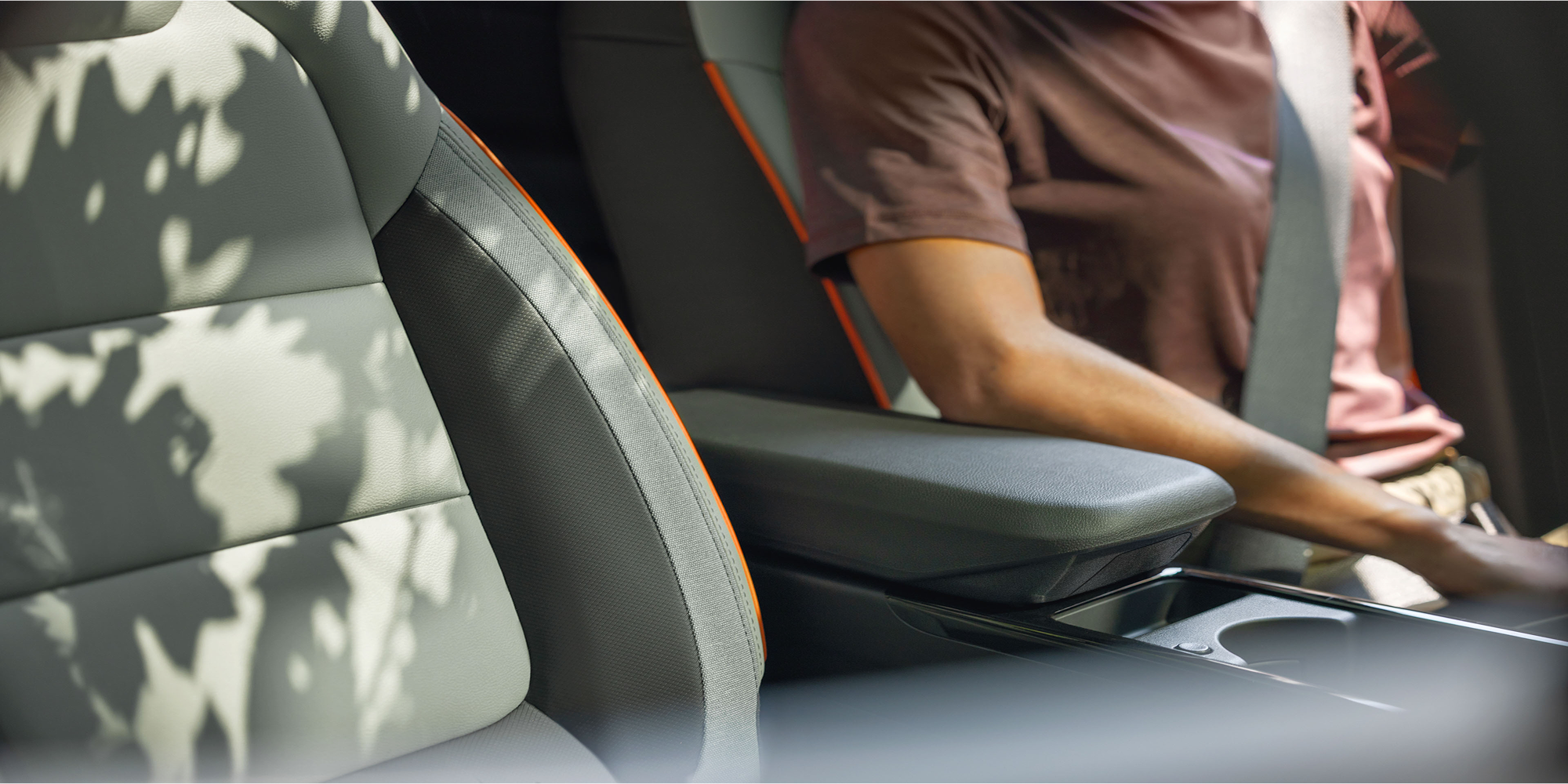 Close-up of the 2027 Chevrolet Trailblazer front seats featuring premium upholstery with contrast stitching and orange accent trim.