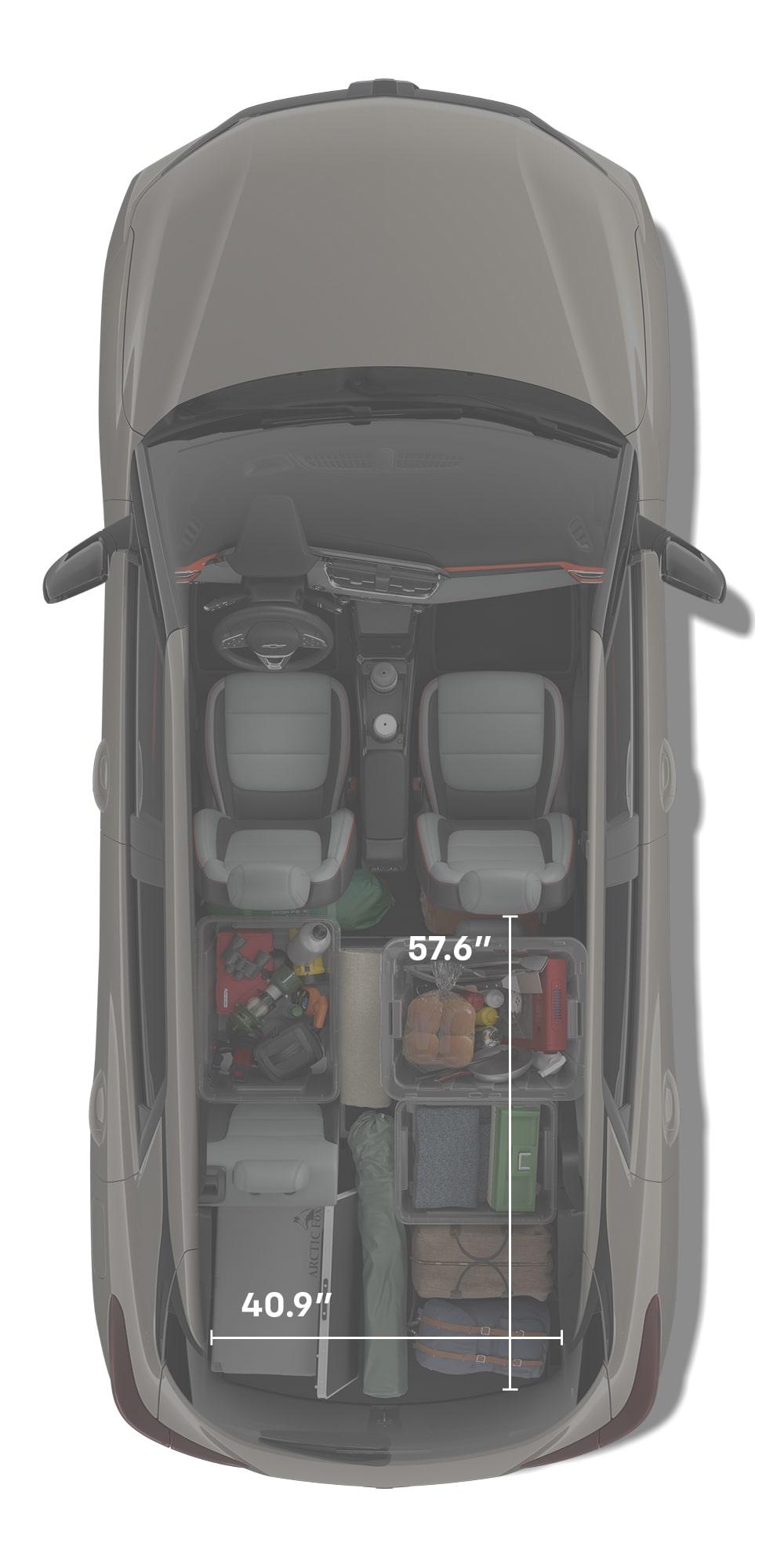 Top-Down View of a Red Chevrolet Blazer EV's Interior Faded, Showing a Golf Bag, Briefcase, a Jacket, and Dimensions
