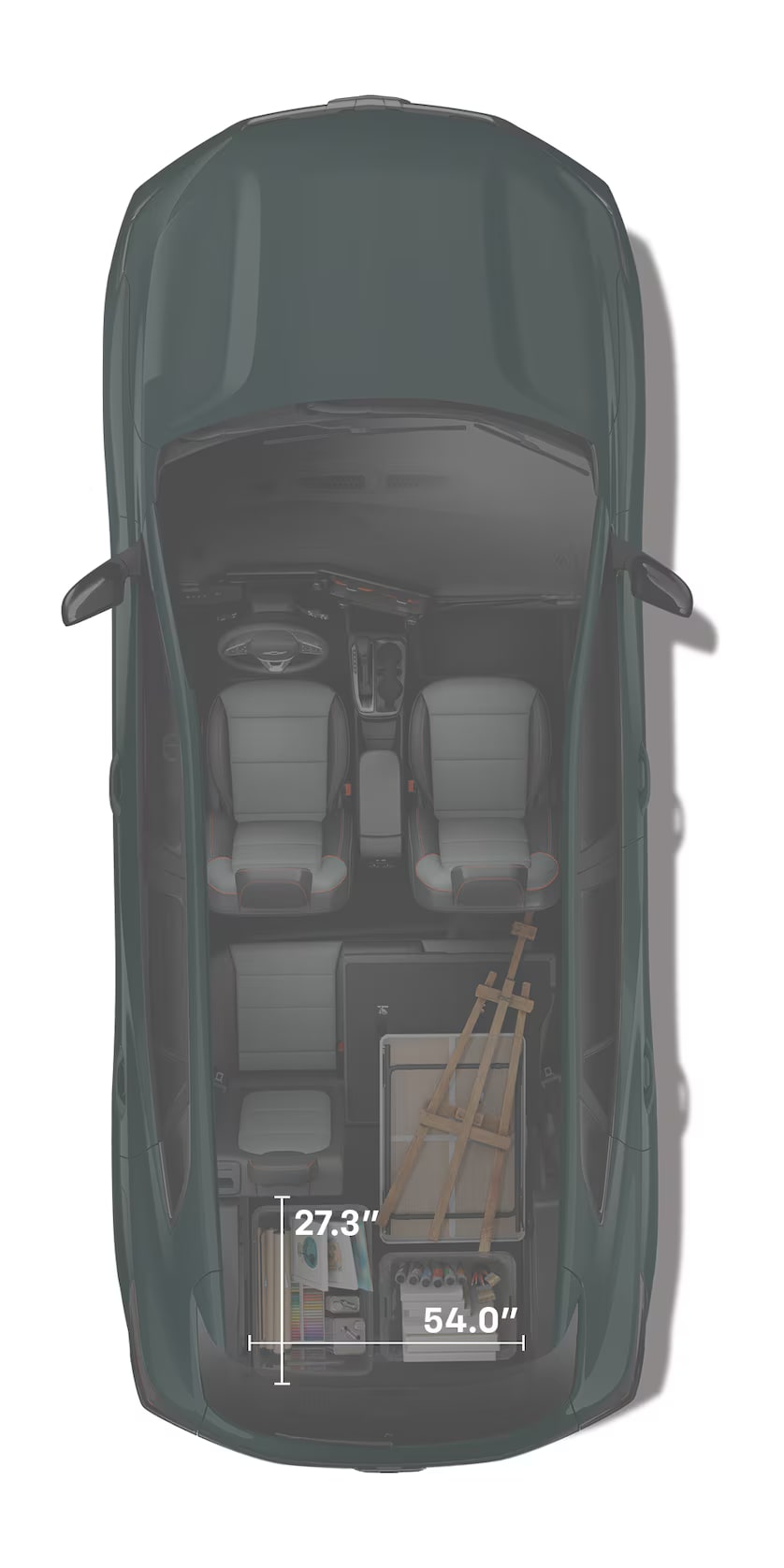 Top-down interior view of the 2027 Chevrolet Trax small SUV with the rear seats folded flat, loaded with art supplies, storage containers, and a folding easel to demonstrate cargo space and hauling versatility.