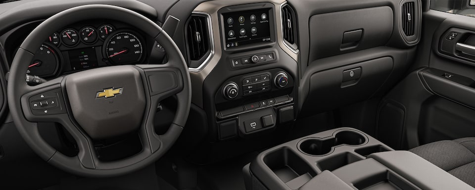 2021 Silverado Chassis Cab front interior featuring the steering wheel, dashboard, and infotainment system.