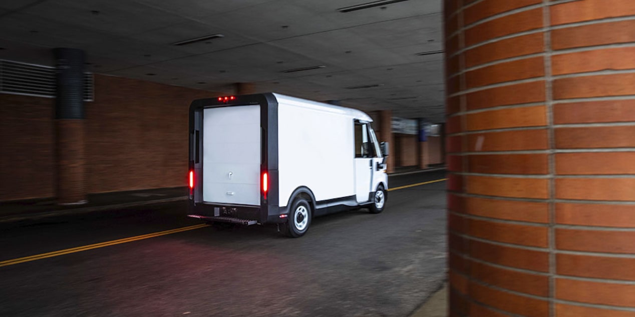 BrightDrop Van Parked in a Loading Zone of a Building 