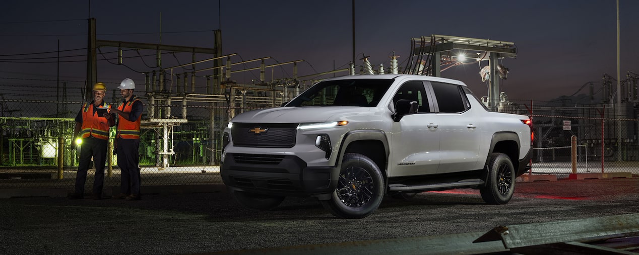 2026 Chevrolet Silverado EV Work Truck Parked at a Construction Site at Night.