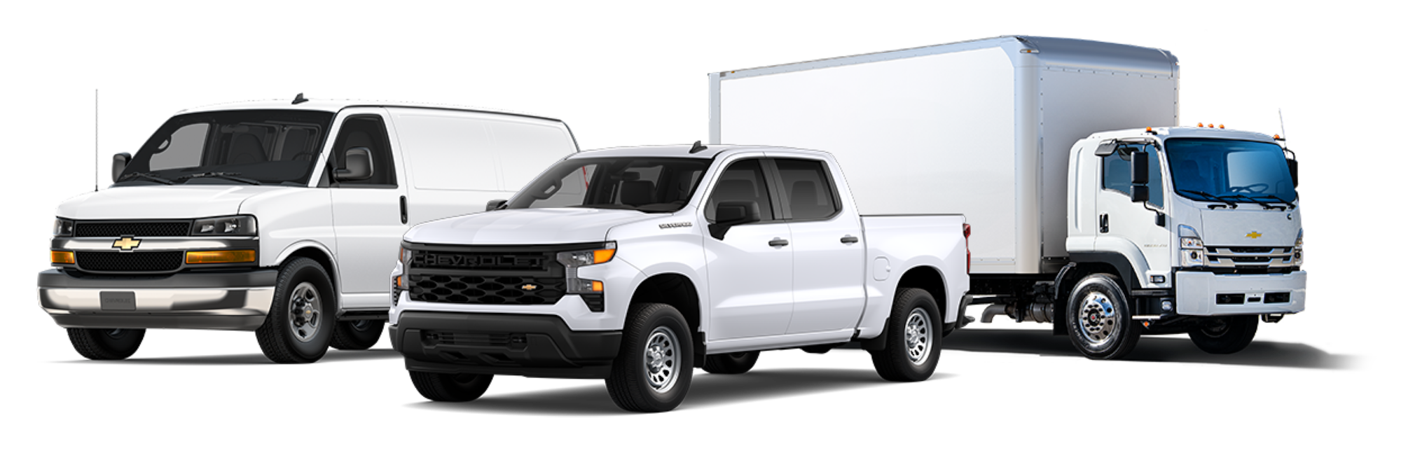 Three Chevrolet Commercial vehicles.