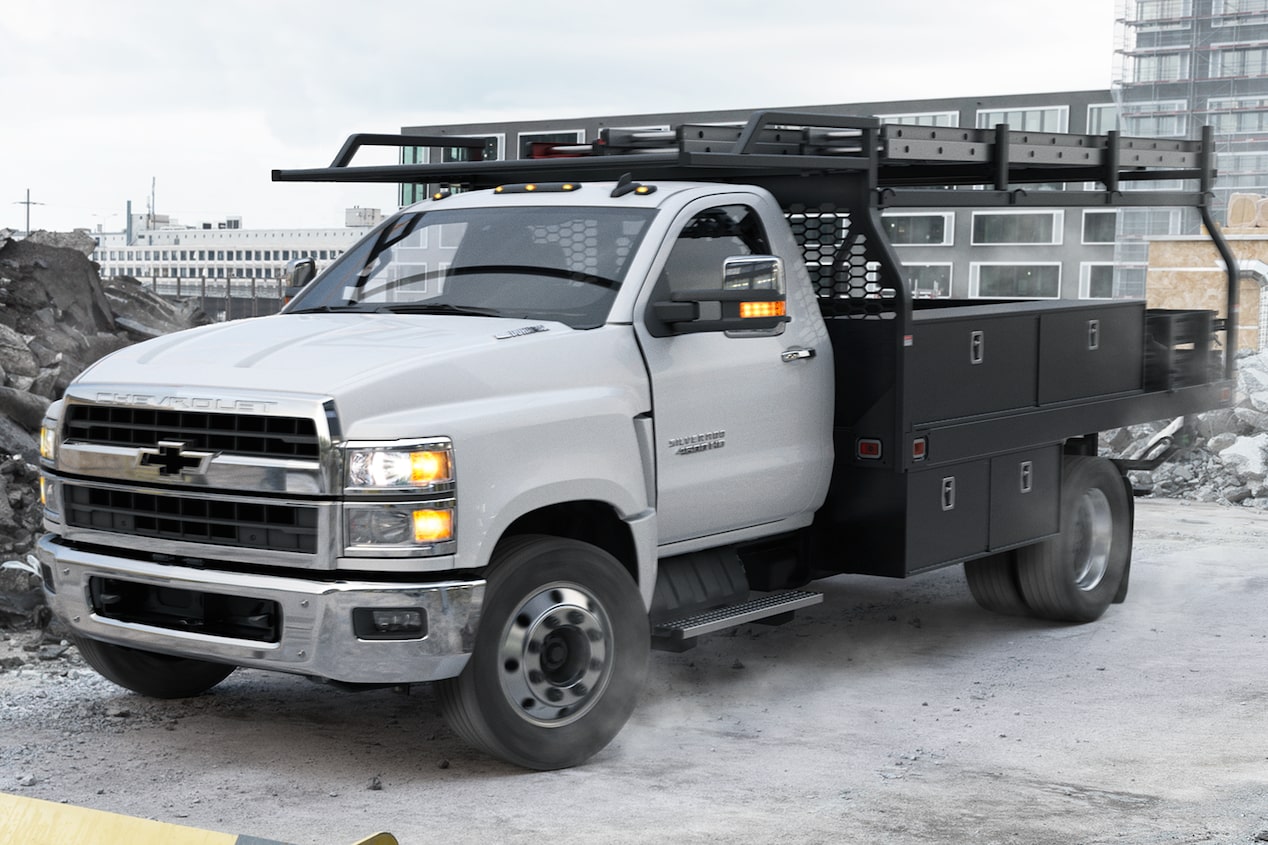 A Chevrolet commercial Chassis Cab parked at job site.
