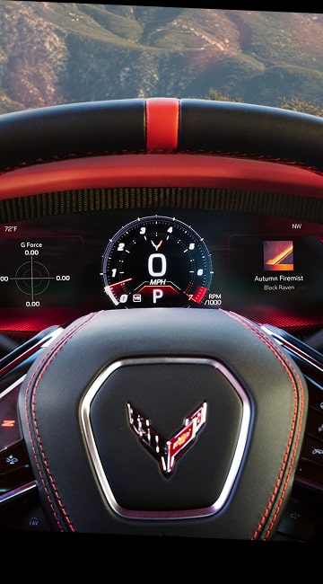 Gros plan sur les détails du volant et du tableau de bord du pilote de la Chevrolet Corvette Grand Sport 2027.