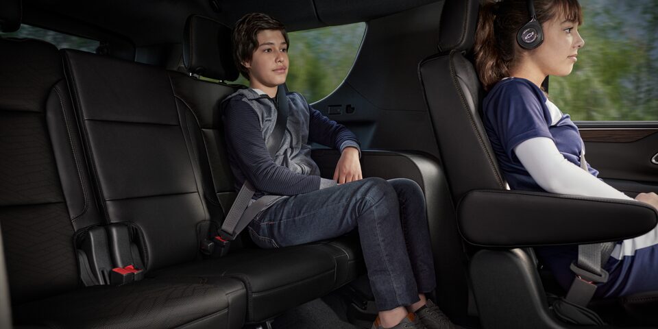 Young people inside the 2023 Chevrolet Suburban.